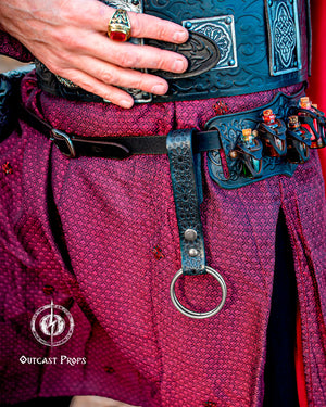Close-up of a person wearing a detailed belt with decorative elements, likely from a costume or prop, with 'Outcast Props' branding. 20 Plain leather belt