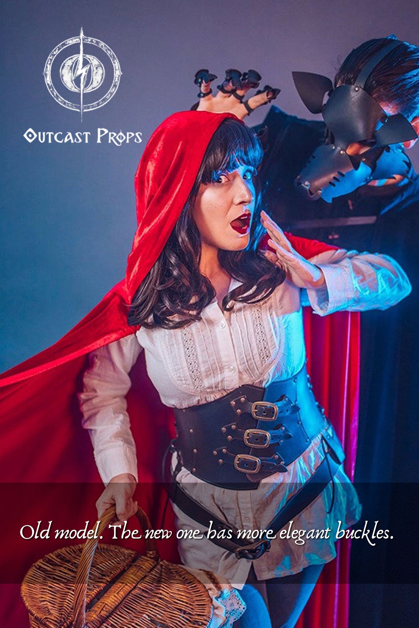 Close-up of an actress in Red Riding Hood cosplay wearing the earlier black leather corset model by Outcast Props. The latest version introduces nickel fittings and smoother buckle design for a more elegant steampunk waist cincher. Crafted for witches, alchemists, and fantasy heroines, it enhances any ren faire costume or gothic outfit with artisan quality and cinematic style.