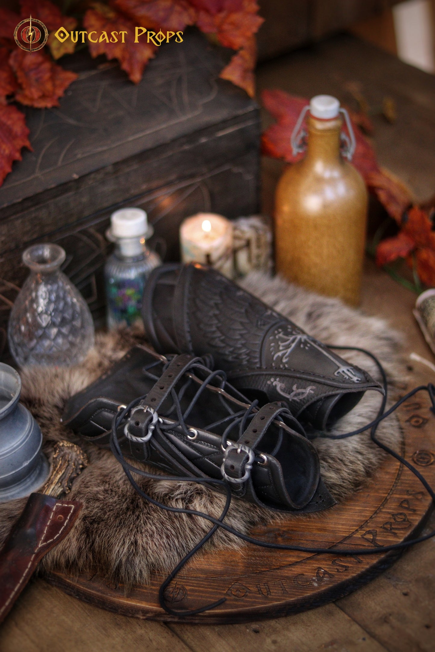 Handcrafted leather vambraces featuring embossed White Tree of Gondor design, with green and brown coloring, suitable for LARP, cosplay, and medieval reenactment.