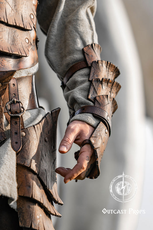 Dragon Scale Leather Bracer: LARP Cosplay Armor for Fantasy Warriors, Orcs, Archers - Handmade Medieval Costume Close-up of a hand wearing a detailed leather glove with armor plating, blurred background