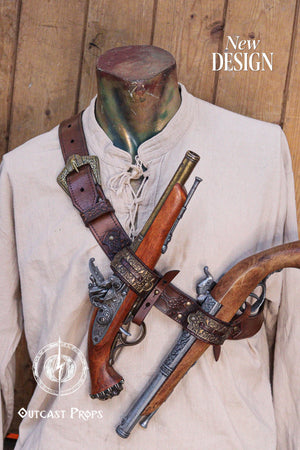 Edward Kenway pirate cosplay. A woman poses outdoors wearing a brown leather pirate baldric load. Front view of a complete leather baldric worn across a cream shirt, displaying two antique flintlocks in embossed holsters. The brown leather is aged and textured, with ornate brass fittings and pirate-style floral tooling. A high-quality cosplay accessory for pirate LARP, fantasy characters, or Renaissance events. Adjustable and designed for both comfort and realism, this piece completes any swashbuckler .