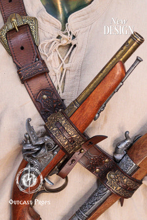 Edward Kenway pirate cosplay. Shoulder close-up of a brown leather pirate baldric strap featuring a unique antiqued brass connector with floral ornamentation. The leather has been burnished and stitched for durability and style. Perfect for Edward Kenway or pirate cosplay, LARP costumes, and fantasy attire. This piece adds historical depth and practicality to any character design, securing gear while enhancing visual impact.