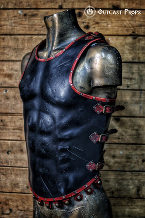 Roman leather musculata cuirass for LARP and cosplay, crafted in black leather with red trim and riveted buckles. This gladiator armor features a muscular chest design, perfect for Spartacus cosplay or Roman reenactments. The color contrast and sculpted torso help visually impaired users distinguish shapes and textures. Handmade with vegetable-tanned leather for historical accuracy and comfort.