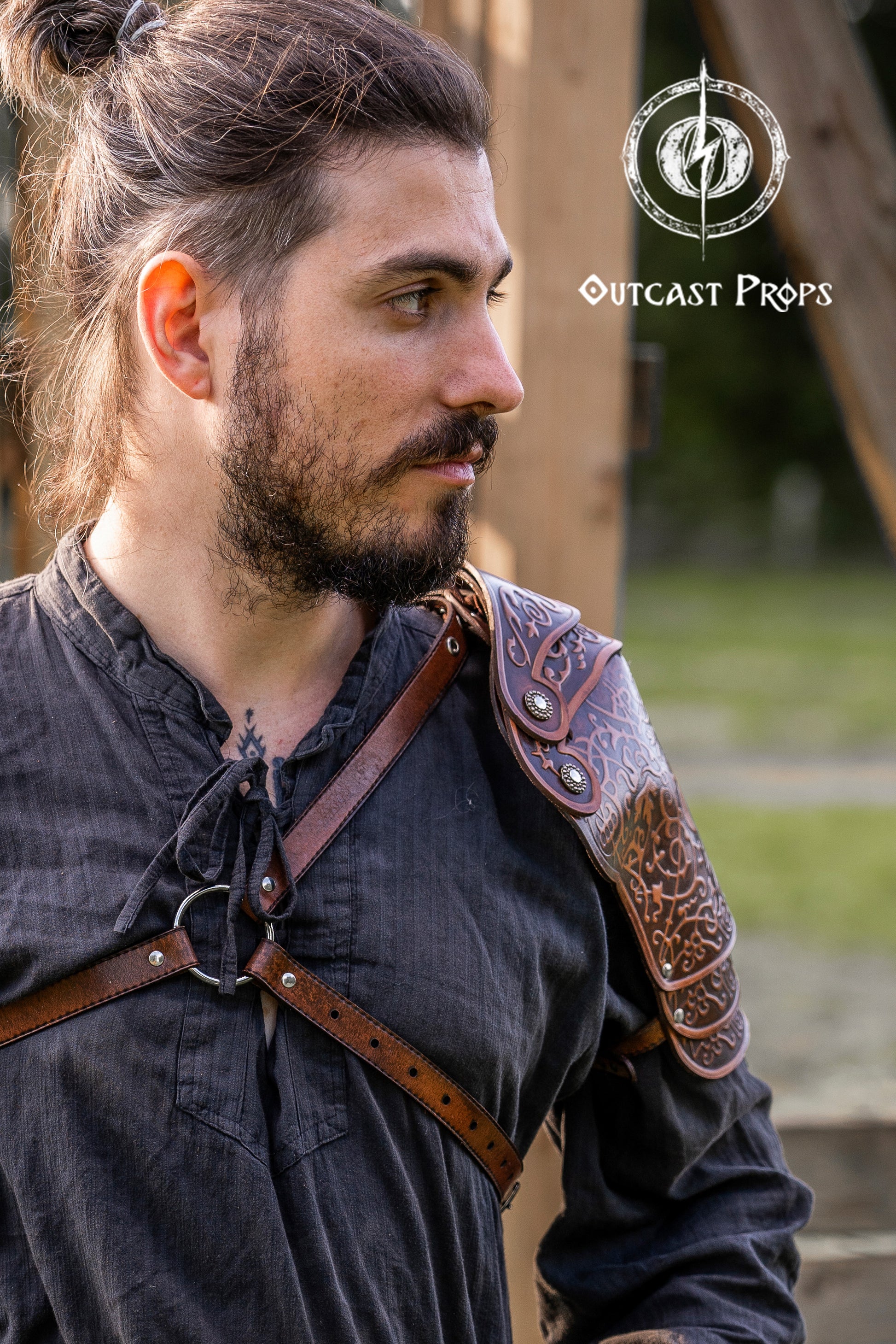 Man wearing historical armor with 'Outcast Props' logo in the corner. Leather Shoulder Pauldron: Musketeer Armor for LARP, Renaissance LARP, cosplay, Ren Faire accessory, Aramis inspired