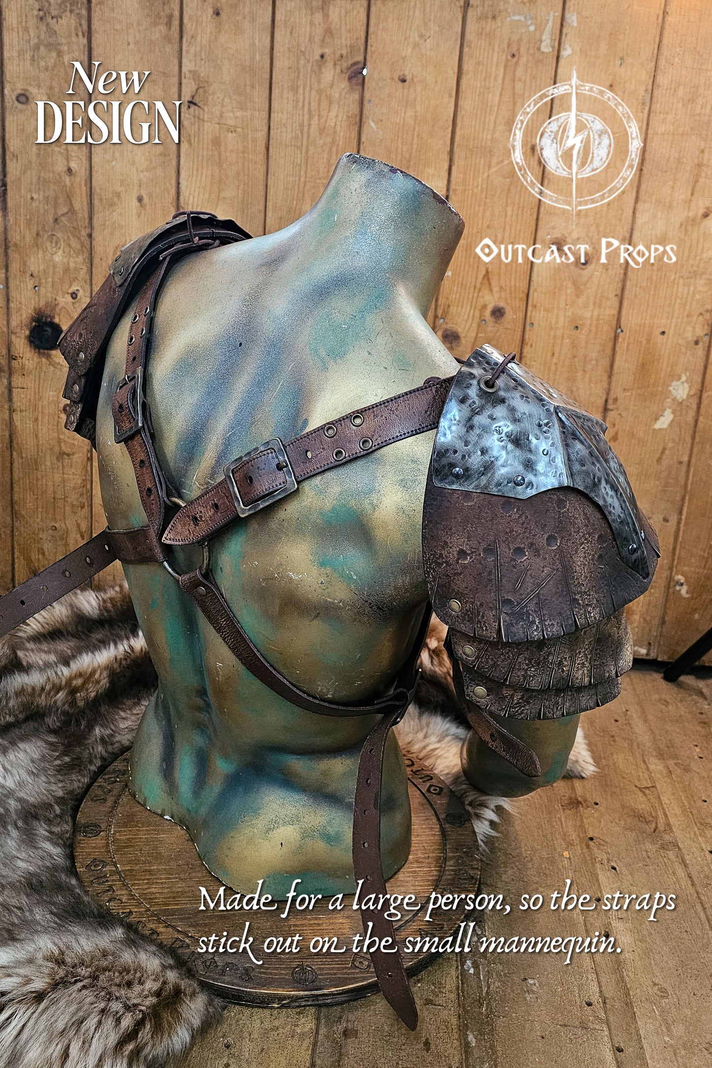 Angled back view of the leather and metal pauldron set on a mannequin, showing the brown harness straps and ring connectors. The armor combines barbarian and Viking influences with orcish roughness, perfect for LARP, cosplay, or post-apocalyptic costumes. Outcast Props creates each piece by hand using vegetable-tanned leather and hammered steel plates.