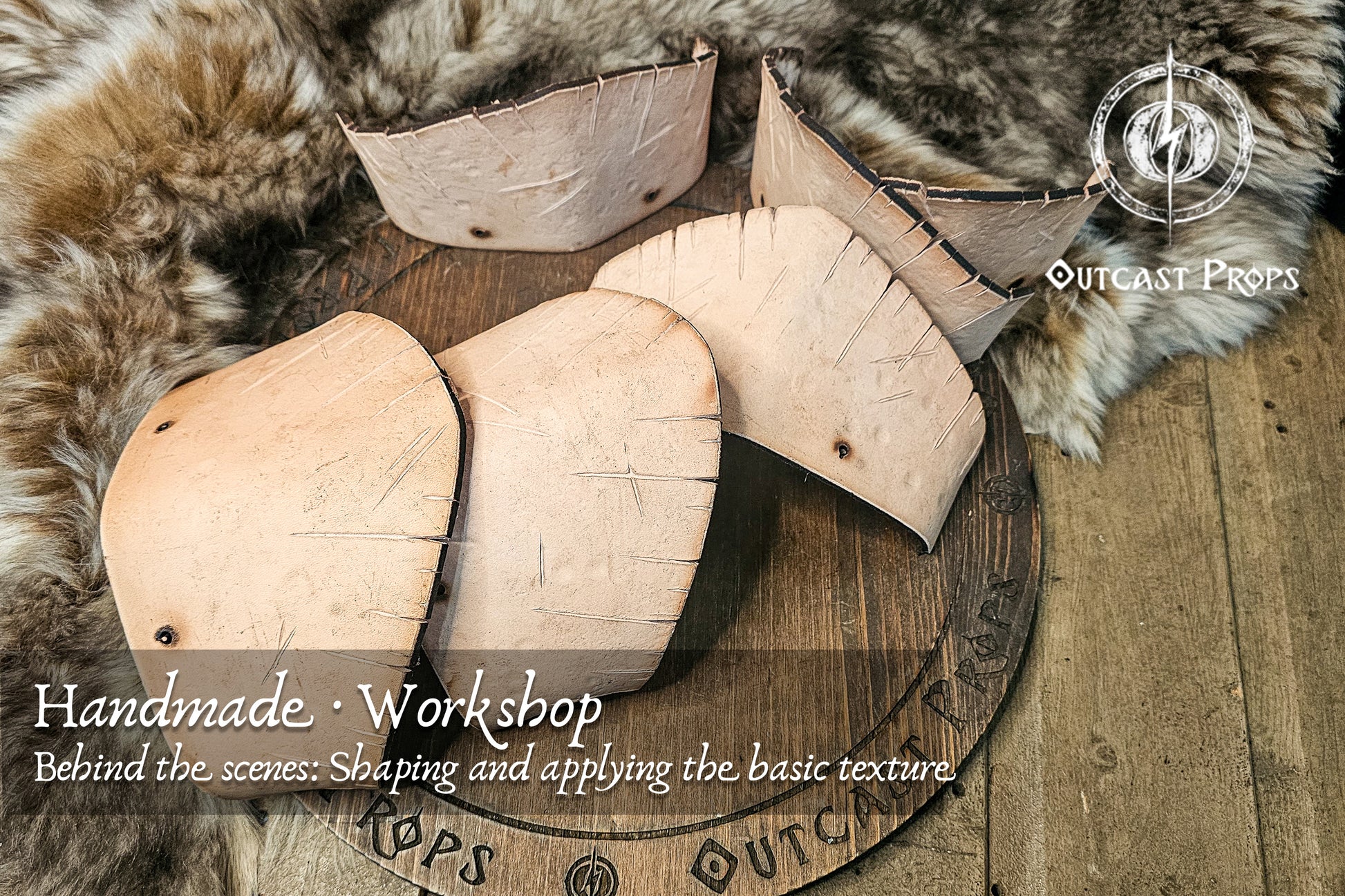 Raw leather pauldron pieces in early workshop stage, showing carved textures and shaping marks on natural vegetable-tanned leather. The photo reveals how Outcast Props artisans form the base of each ork and Viking-inspired shoulder armor before dyeing. Ideal for showing the handcrafted process behind LARP and barbarian costume armor. Barbarian Leather and Metal Pauldron Set for LARP Viking Warrior or Ork Cosplay Armor Shoulder Pads for Post Apocalyptic Costume