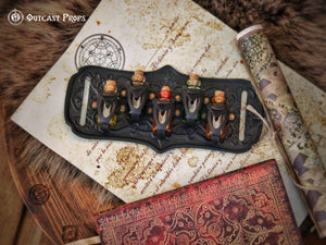 A handmade leather potion holder with ornate embossed patterns, designed to hold five small glass vials. The holder is displayed on a furry surface, and the vials have cork stoppers. Ornated Belt potion holder | 5 potion Belt carrier | LARP, cosplay, fantasy alchemist accessory, adventurers, steampunk, alchemist, healers