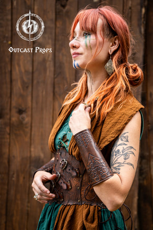 Shadowbinder bracer for mages & wizards, sorcerer vambarce for larp costume and wizardry cosplay leather witchcraft handmade. Person in a fantasy costume with Outcast Props logo in the corner