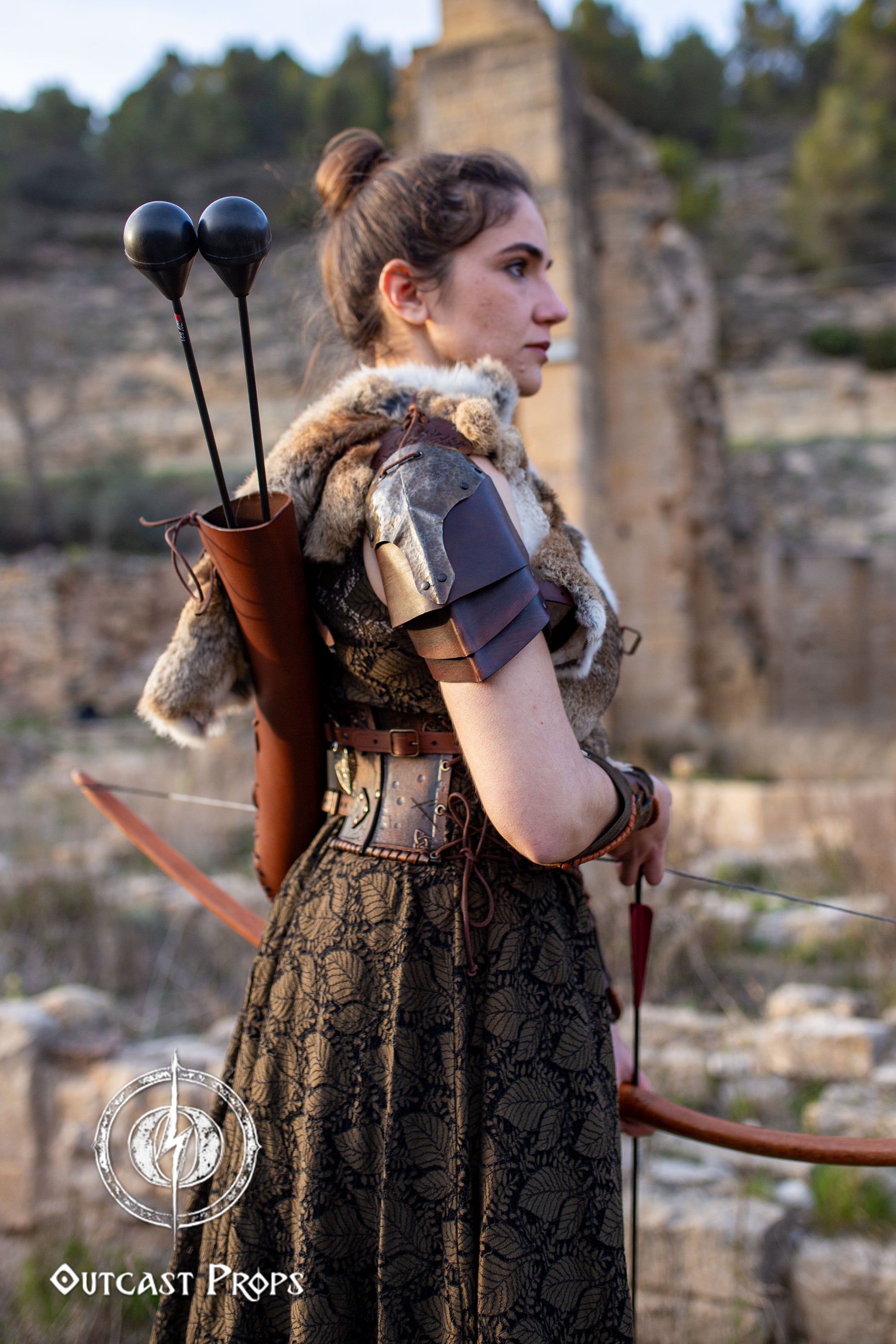 Leather quiver elven quiver archery quiver arrow quiver larp quiver elf quiver bow quiver leather arrow quiver quivers for arrows cosplay. Person in medieval or fantasy costume with archery equipment in a natural setting