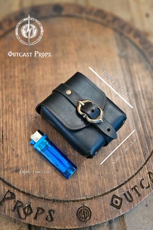 Tavern Small Leather Belt Pouch for Daily Wear LARP Renaissance Fair Viking Cosplay Medieval Accessory Steampunk Coin or Tobacco Pouch. Black leather pouch with gold buckle on a wooden surface, featuring Outcast Props branding.