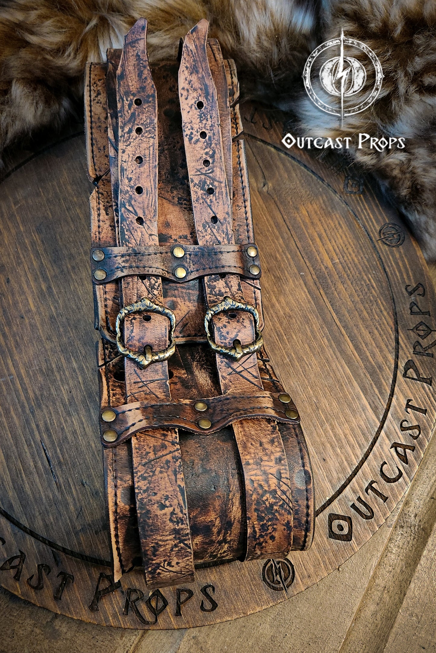 Black doble leather broadbelt with silver buckles on a wooden surface with 'Outcast Props' branding. Veteran Leather Belt. Medieval leather belt. Orc belt. Warrior belt for larp.