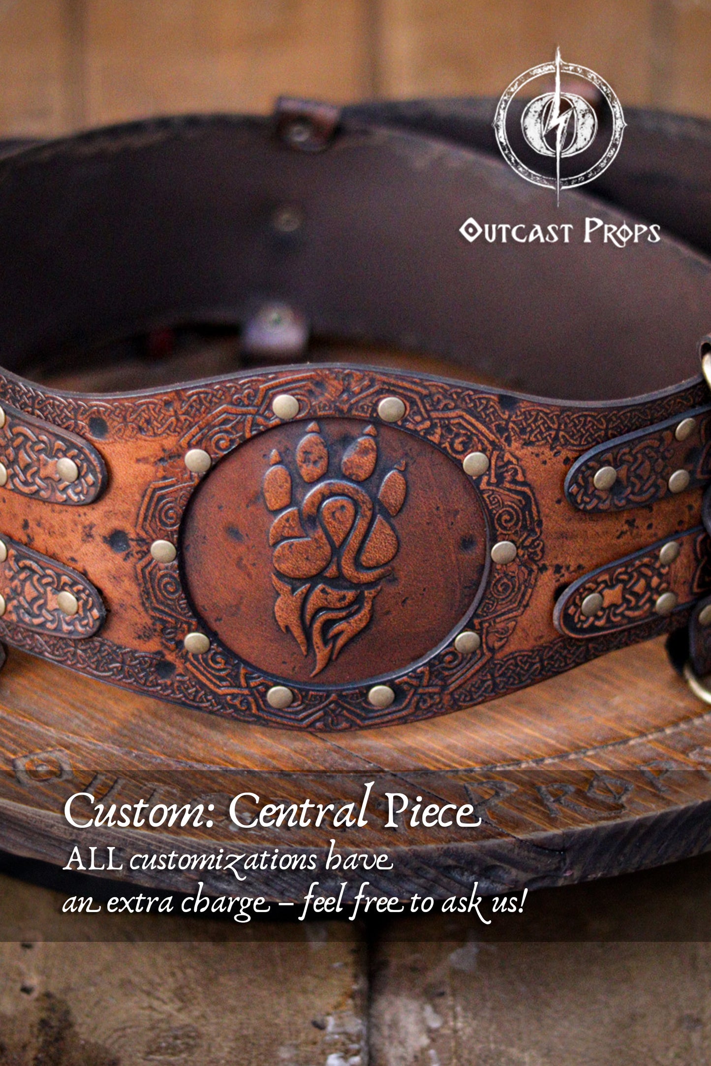 Custom engraved central pieces for the viking leather armor belt. Three variants shown: Valknut, wolf head, and tribal bear paw, all framed by knotwork and rivets. Displayed over rustic wood and fur. Keywords: celtic fantasy belt, barbarian cosplay outfit, medieval warrior armor, LARP belt customization, renfaire costume wide.