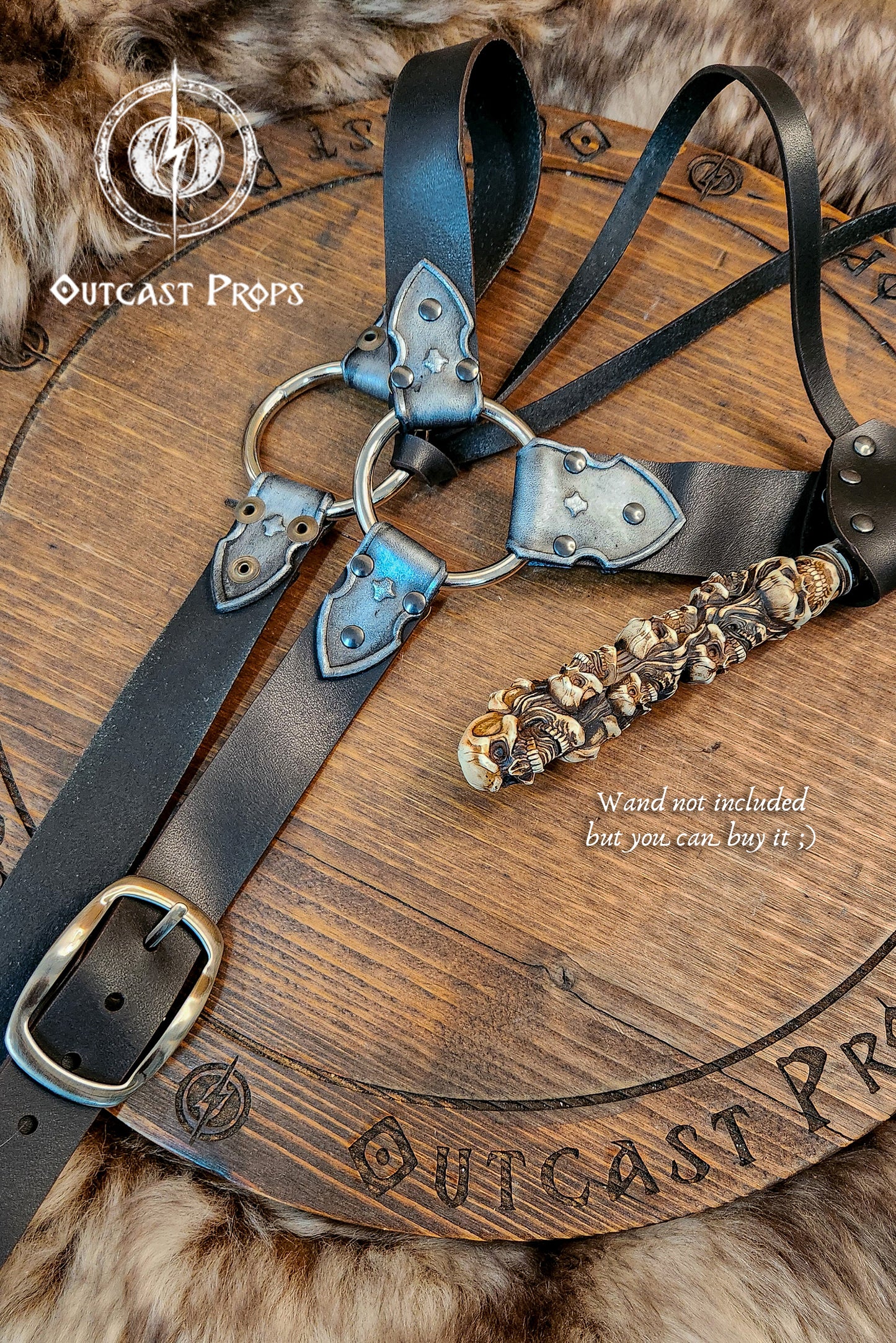 A black leather wand holster with dual metal rings and riveted construction. Styled for Voldemort-inspired cosplay or LARP magic duels. Crafted for comfort and realism in wizard costumes, especially for Harry Potter fans recreating Death Eater aesthetics.