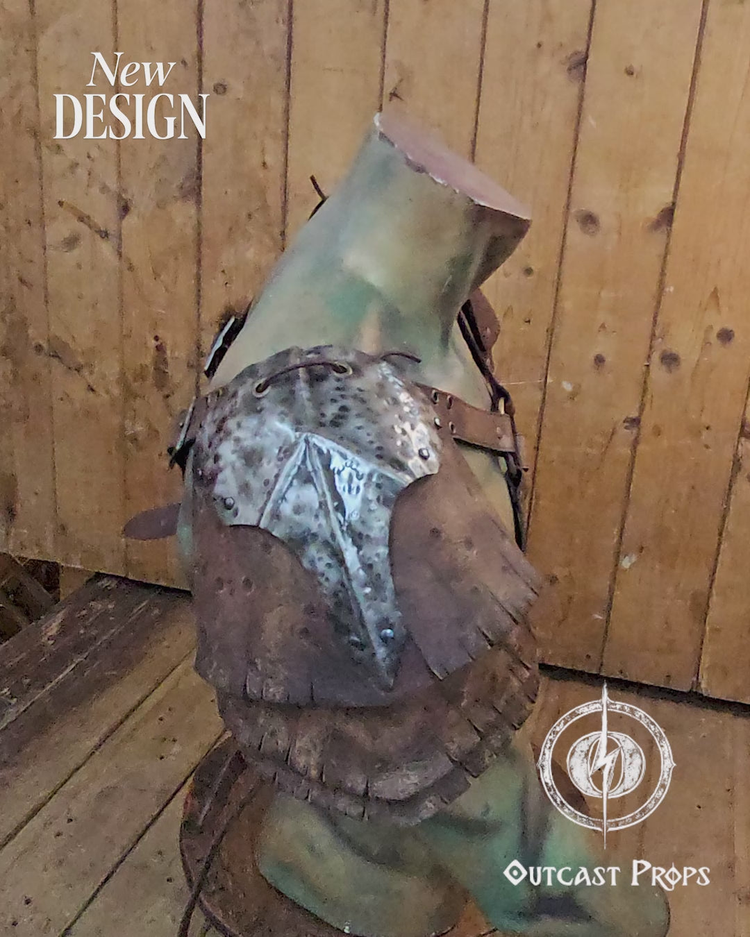 Front view of the new Outcast Props design showing the complete double pauldron armor with crossed chest harness. The layered aged brown leather and hammered steel plates blend Viking, barbarian, and ork aesthetics. Each shoulder piece connects to the adjustable harness straps, creating a durable LARP and cosplay armor handcrafted with cinematic aging and detailed craftsmanship. Barbarian Leather and Metal Pauldron Set for LARP Viking Warrior or Ork Cosplay Armor Shoulder Pads Post Apocalyptic