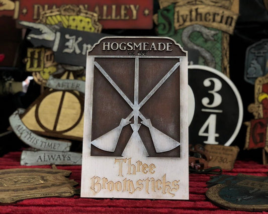 Three Broomsticks Wood Sign.