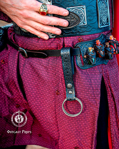 Close-up of a person wearing a detailed belt with decorative elements, likely from a costume or prop, with 'Outcast Props' branding. 20 Plain leather belt