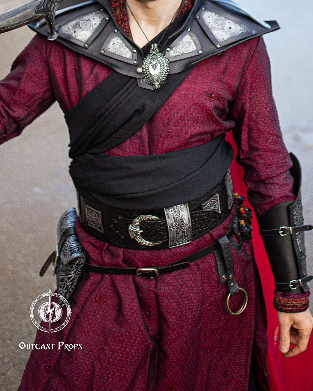 Person wearing a detailed costume with armor and belt, featuring Outcast Props logo. 20 Plain leather belt