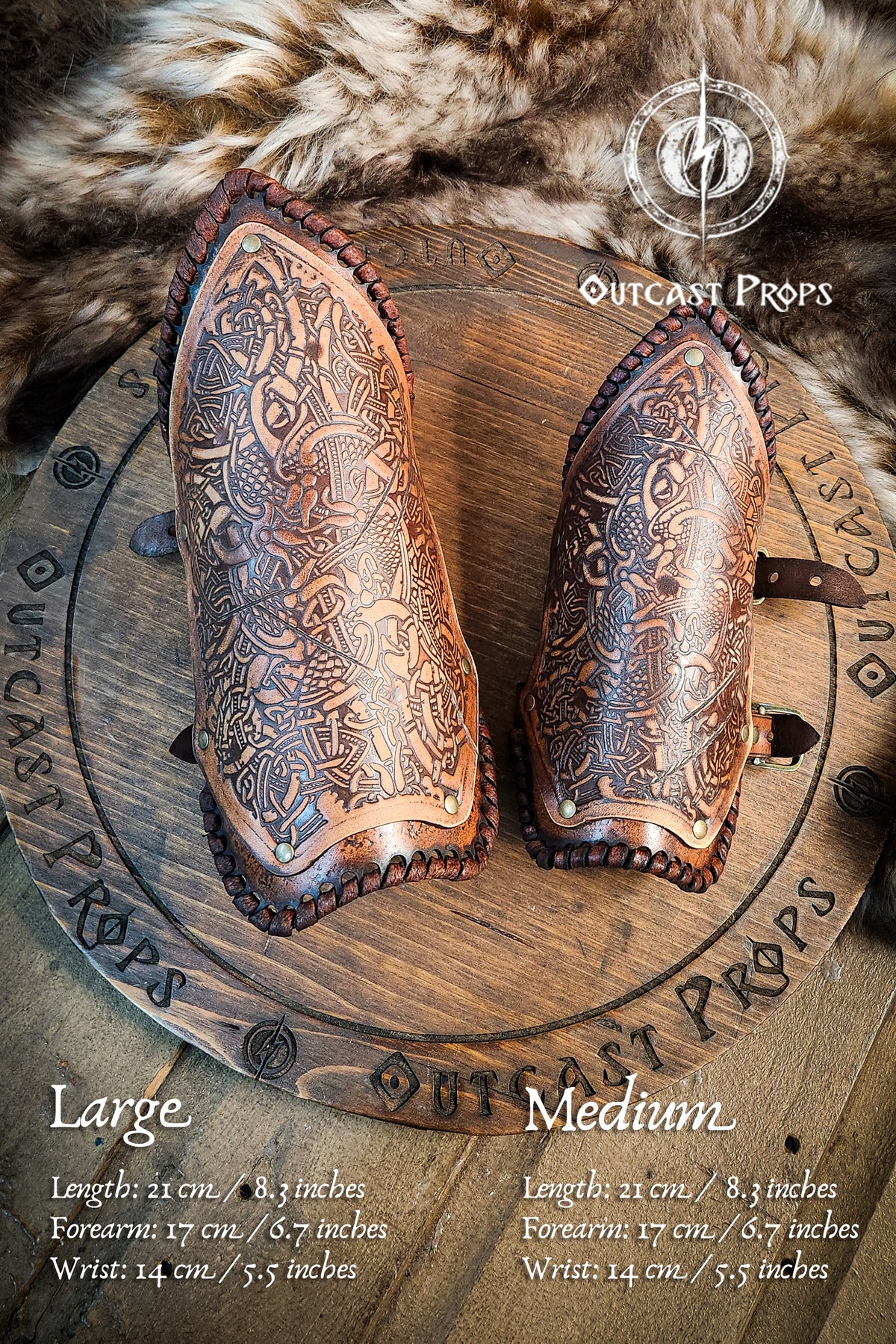 Pair of leather gauntlets with intricate designs on a wooden board, branded 'Outcast Props'. Viking Leather Bracers with Norse Knot Engraving for LARP Cosplay Medieval Fantasy Roleplay Handmade Armor Custom Gear for Men or Women