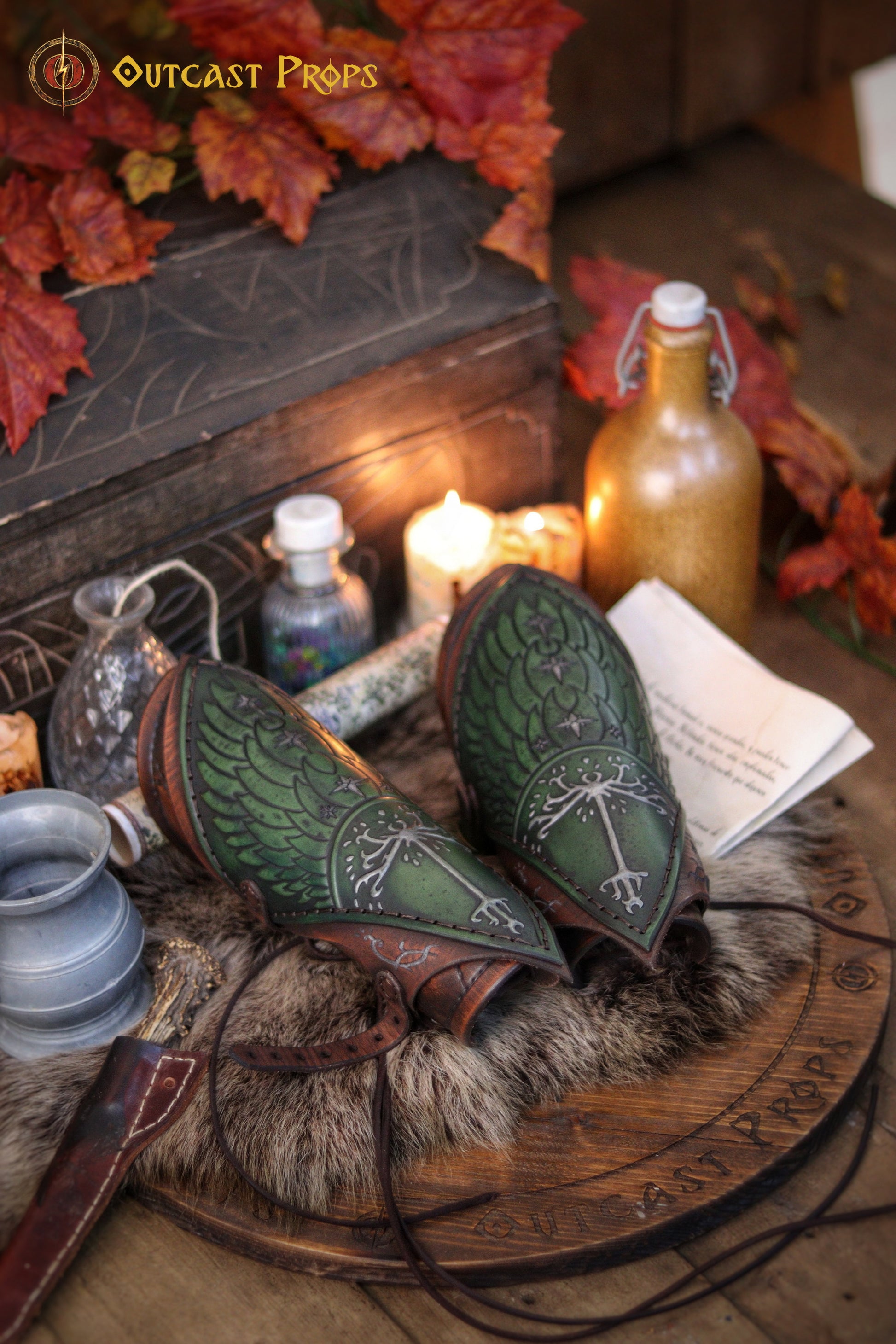 Handcrafted leather vambraces featuring embossed White Tree of Gondor design, with green and brown coloring, suitable for LARP, cosplay, and medieval reenactment. Handcrafted leather vambraces featuring embossed White Tree of Gondor design, with green and brown coloring, suitable for LARP, cosplay, and medieval reenactment. 