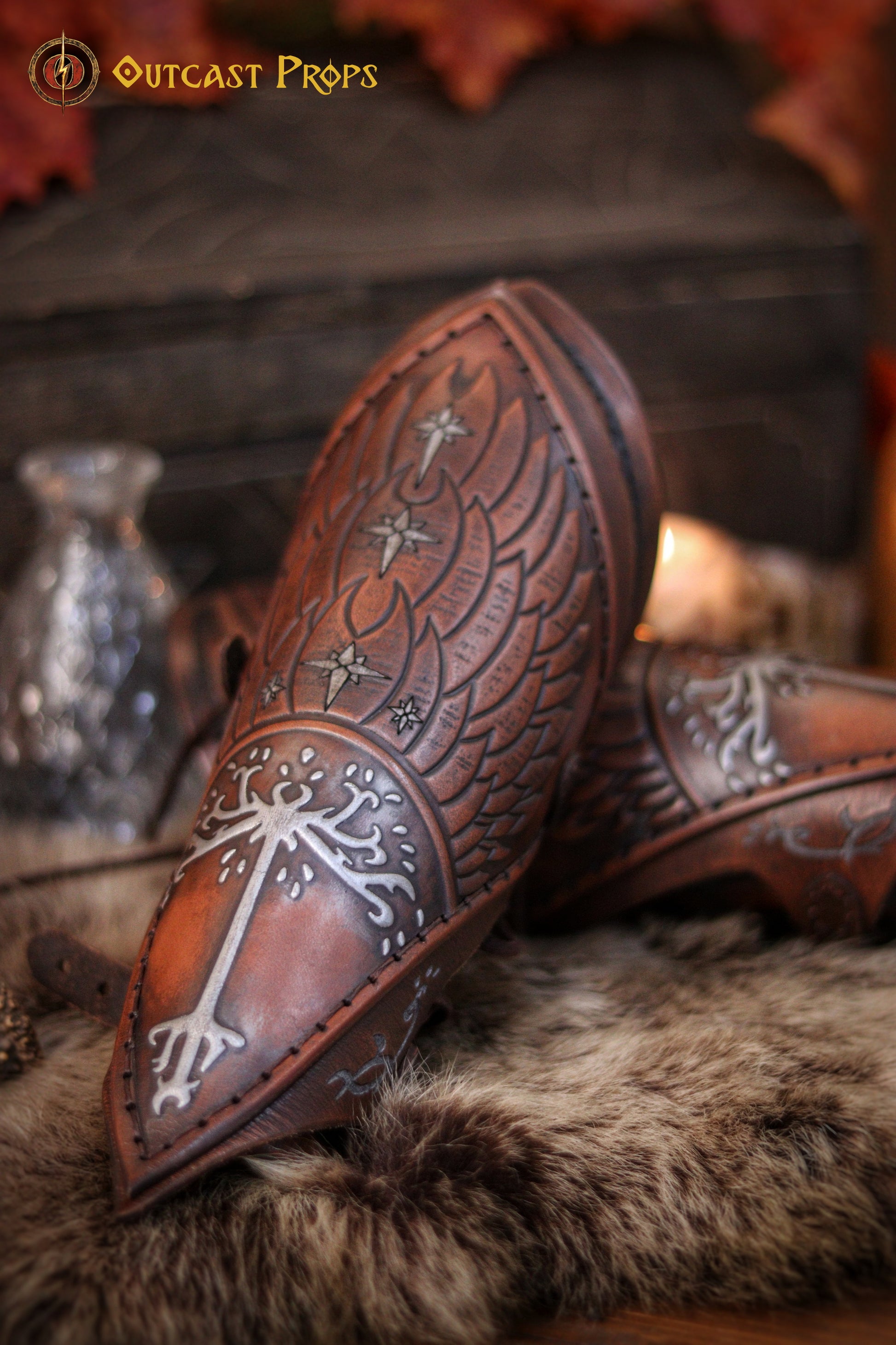 Handcrafted leather vambraces featuring embossed White Tree of Gondor design, with brown coloring, suitable for LARP, cosplay, and medieval reenactment.
