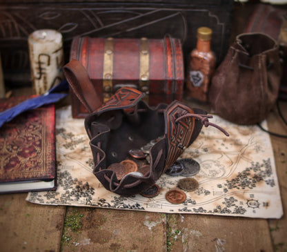 Decorated Leather coin or jewel pouch.