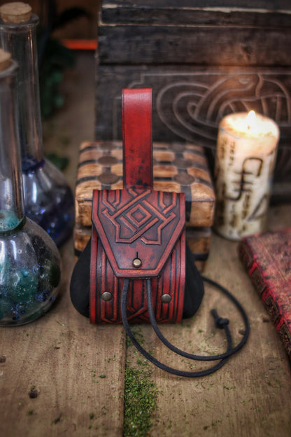 Decorated Leather coin or jewel pouch.