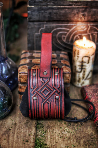 Decorated Leather coin or jewel pouch.