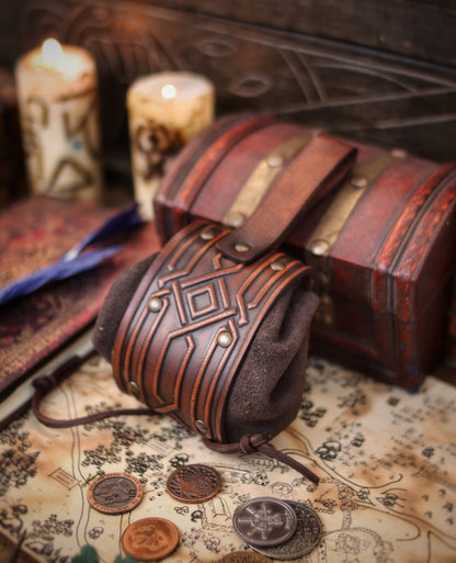 Decorated Leather coin or jewel pouch.