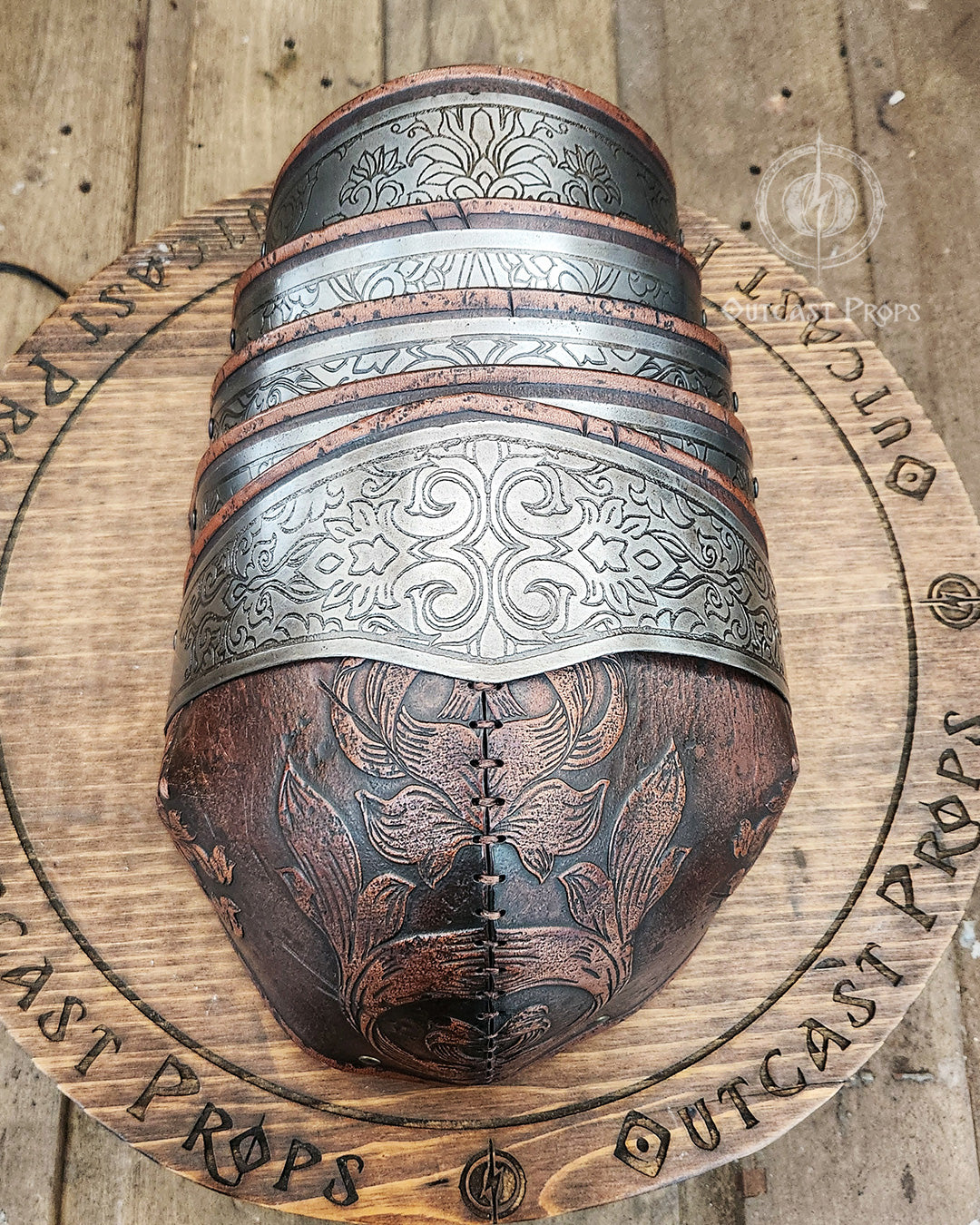 Filigree Armor gorget and articulated pauldrons displayed together
