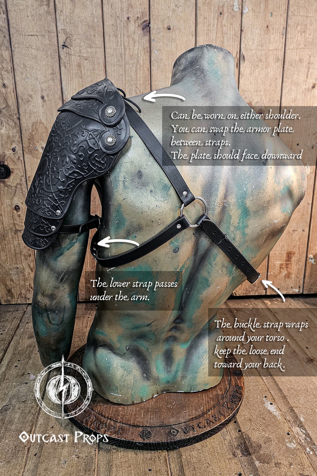 Armored shoulder piece with instructions on how to wear it, displayed on a wooden background. Leather Shoulder Pauldron: Musketeer Armor for LARP, Renaissance LARP, cosplay, Ren Faire accessory, Aramis inspired
