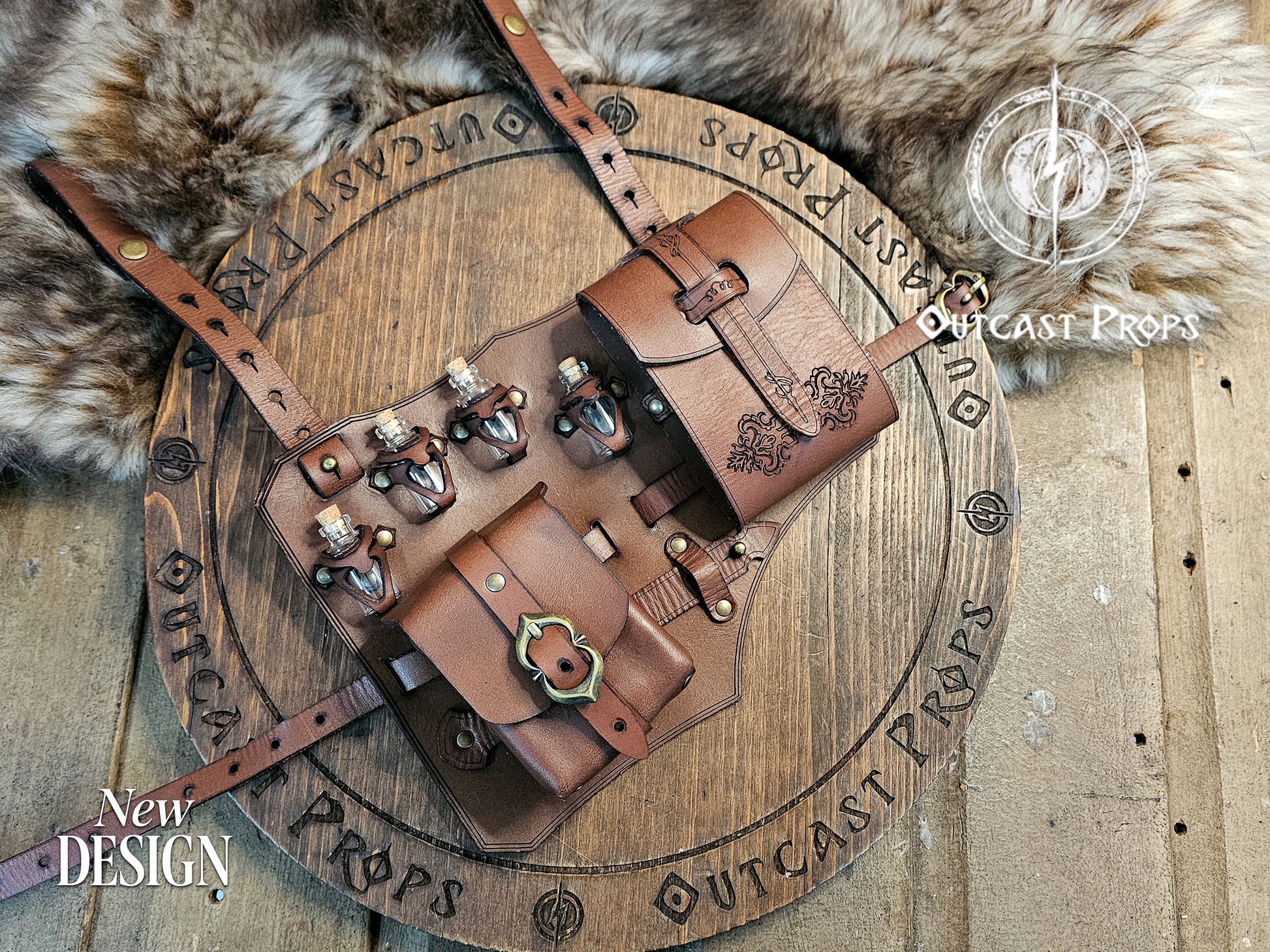 Angled view of the brown leather leg holster showing embossed detail, brass fittings, and potion vial holders on a wooden Outcast Props background with fur texture. Crafted from premium vegetable-tanned leather, this fantasy LARP accessory for alchemists, rogues, and adventurers combines artisan quality, historical inspiration, and practical design for immersive medieval or fantasy cosplay outfits.