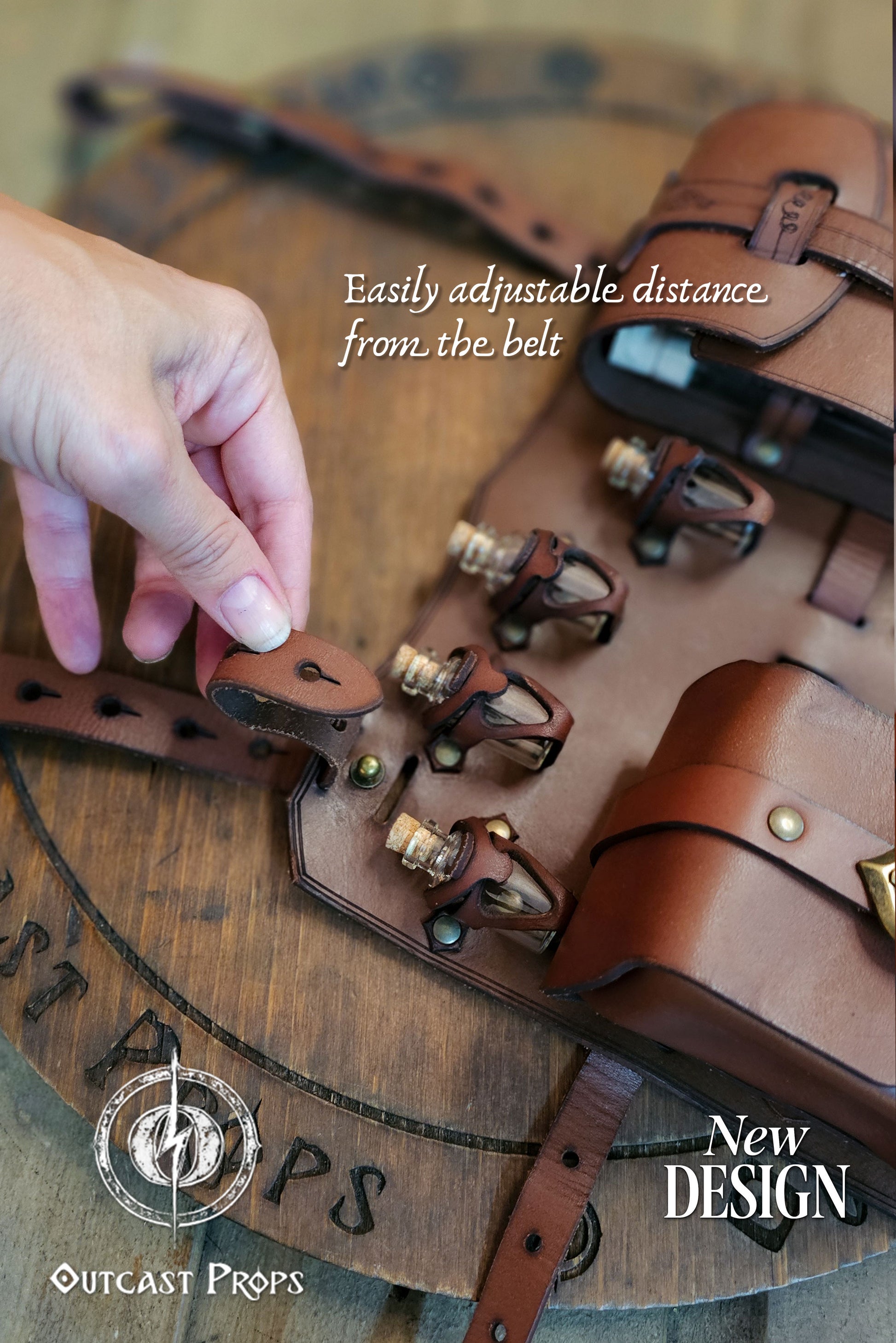 Hand adjusting the brown leather leg holster strap showing the distance from the belt. Includes potion vials in small leather holders with brass rivets. The design allows easy vertical adjustment for wearing comfort. Handmade from full-grain vegetable-tanned leather by Outcast Props, perfect for LARP, cosplay, and renaissance fairs. A functional fantasy accessory for rogues and alchemists with authentic medieval style.