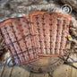 Pair of leather leg guards with metal studs on a fur background. Samurai Leather Greaves for LARP Cosplay or Renaissance Fair Studded Shin Armor Fantasy Warrior Leg Guards Handmade Medieval Costume Piece