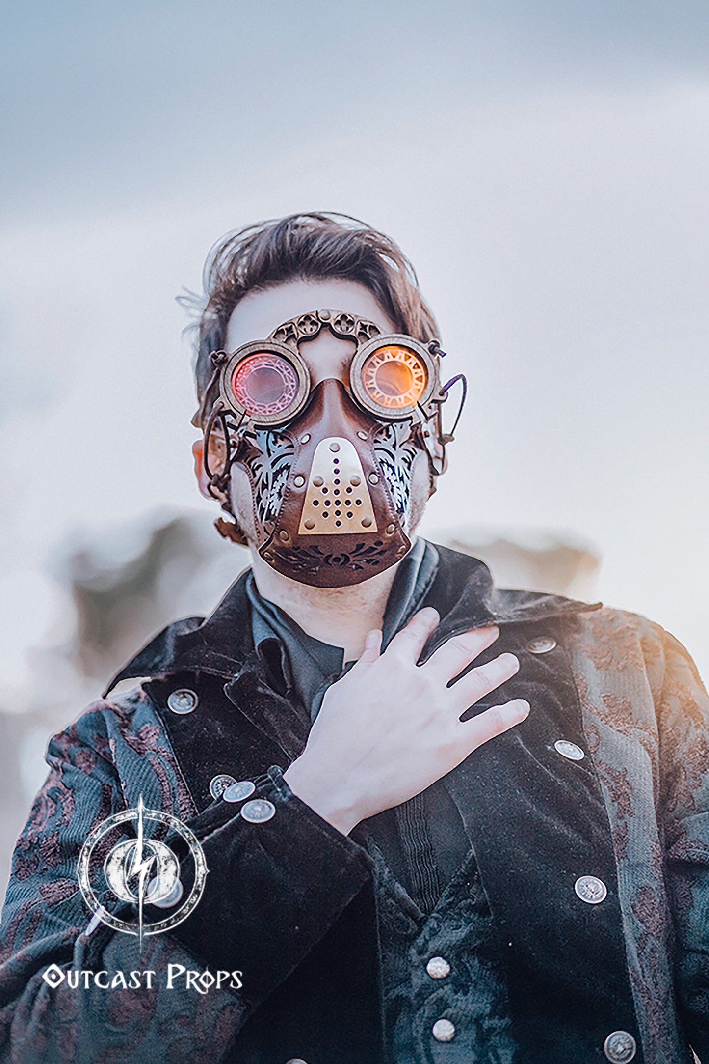 Person wearing a steampunk-style mask with goggles and a detailed design, standing against a blurred background. Alchemist's Wooden Steampunk Goggles: Medieval LARP Eyewear for Fantasy Costumes & Renaissance Fairs