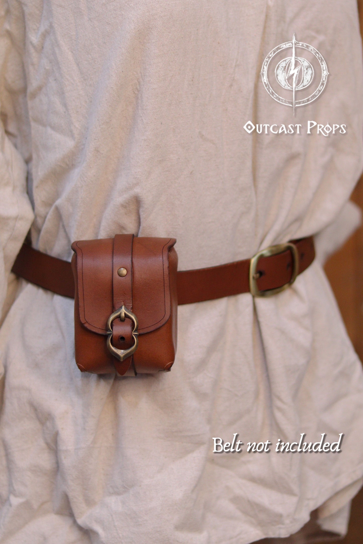 Tavern Small Leather Belt Pouch for Daily Wear LARP Renaissance Fair Viking Cosplay Medieval Accessory Steampunk Coin or Tobacco Pouch. Brown leather pouch with decorative buckle on a person wearing a beige outfit, with 'Outcast Props' branding.