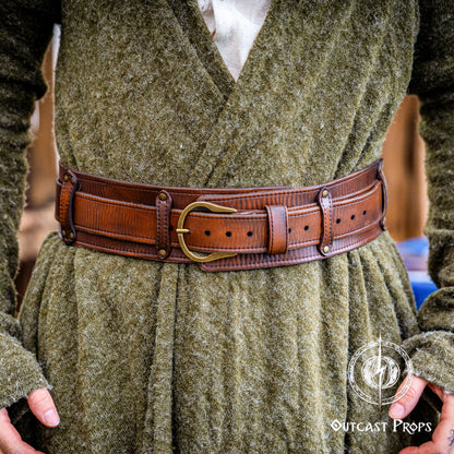 Person wearing a green robe with a brown belt and Outcast Props logo. Celtic knot leather belt silver buckle larp belt for ren fair fantasy costume celtic belt unisex leather belt for renaissance outfit