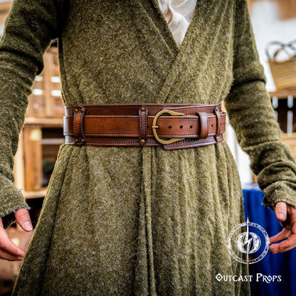 Person wearing a green dress with a brown belt, standing indoors. Celtic knot leather belt silver buckle larp belt for ren fair fantasy costume celtic belt unisex leather belt for renaissance outfit