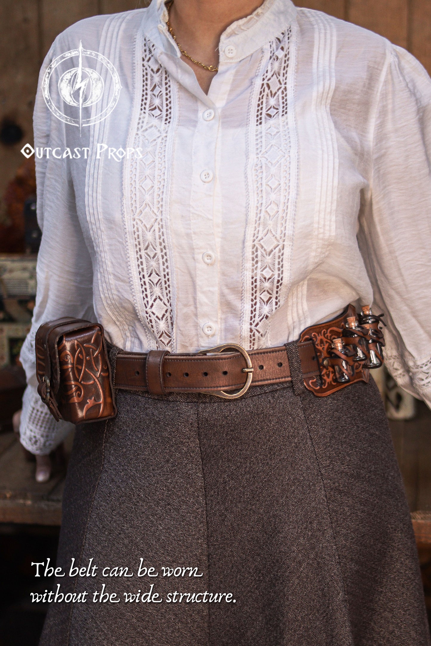 Front view of the Handcrafted Leather Wanderer Belt worn without the wide structure, styled with leather pouches attached to the inner belt. The slimmer configuration highlights the brass buckle, adjustment holes, and smooth vegetable-tanned leather finish. This two-in-one modular leather belt adapts from LARP, Renaissance fairs, and medieval cosplay to practical daily wear, offering versatility for adventurer and fantasy character outfits.