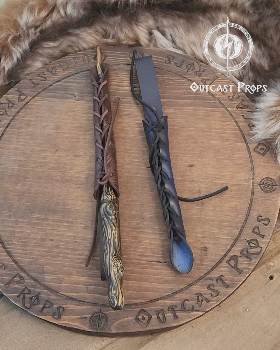 A close-up image of a brown wand holster with a leather strap and lace detail, displayed on an open book with a decorative background. Magic Wand Leather Holster Laced & Aged, perfect sheath for wizzards to hang from your belt, witch wand belt seath cosplay LARP