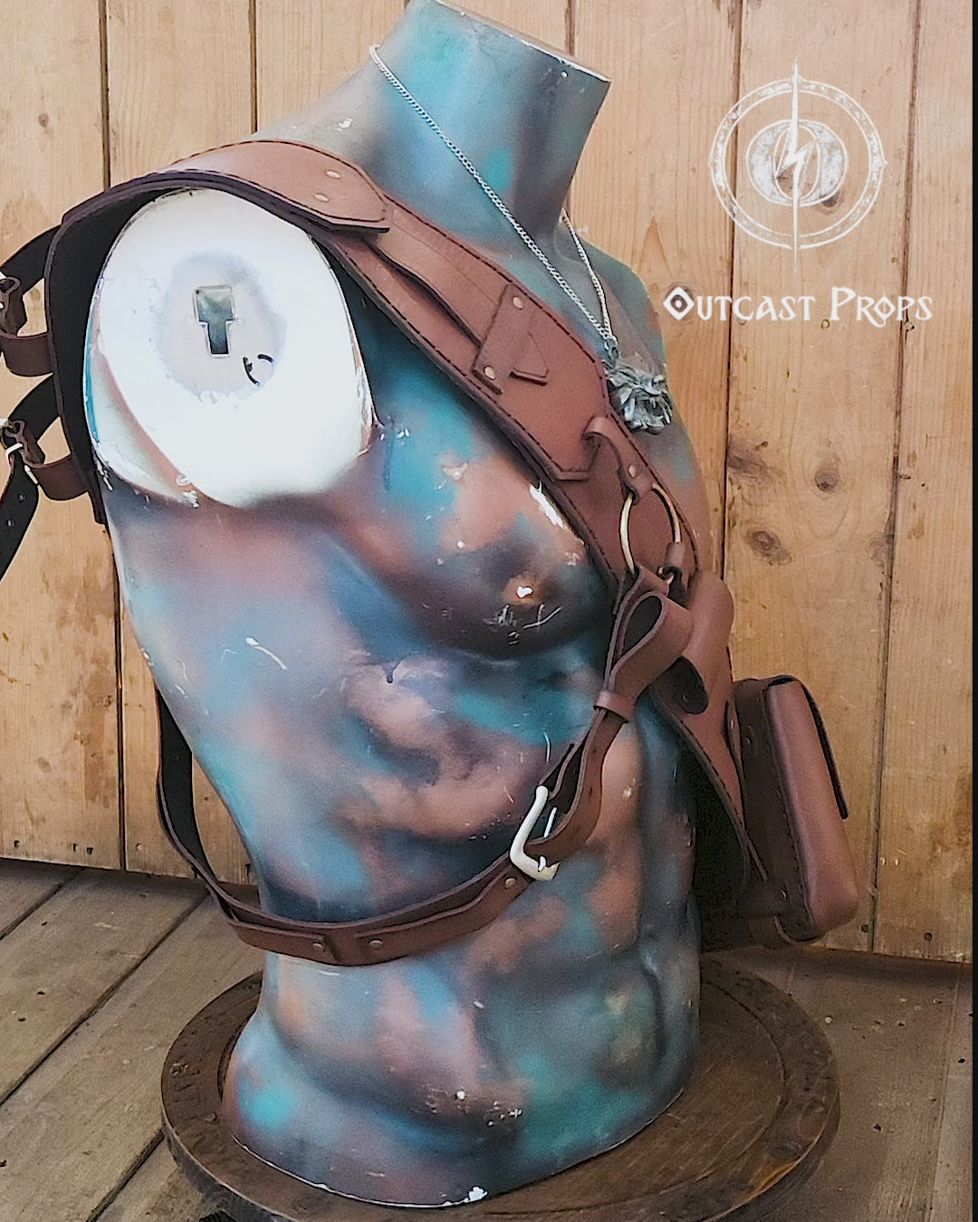 Witcher 3 ursine leather baldric displayed on painted bust with wolf medallion. Features iconic metal ring and pouch design. Perfect leather baldric for Witcher cosplay, Geralt costume, LARP armor builds, bear school armor, and fantasy RPG witcher gear.