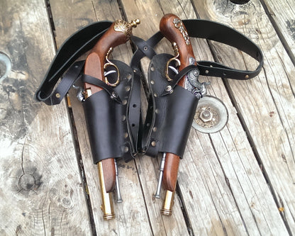 Leather Shoulder holster for two guns.