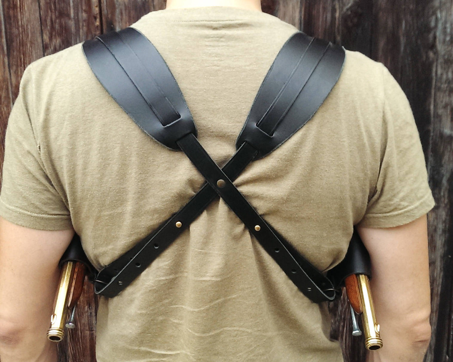 Leather Shoulder holster for two guns.