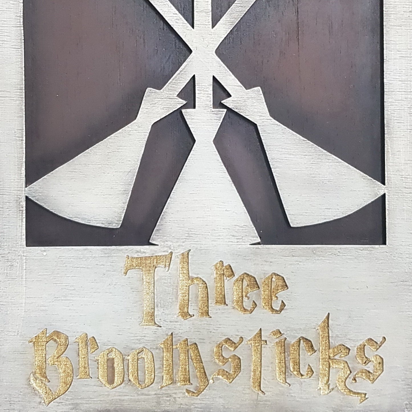 Three Broomsticks Wood Sign.