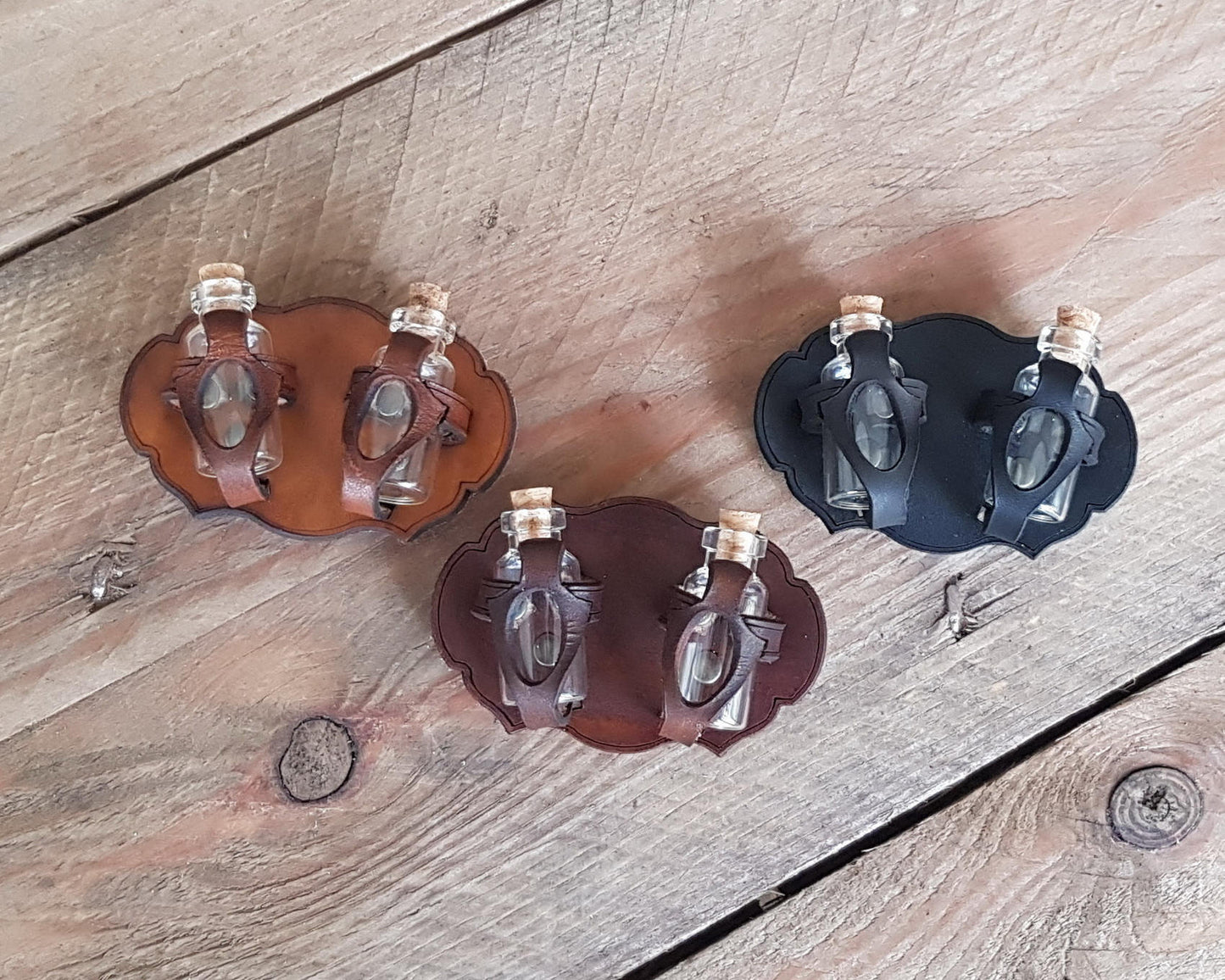 Potion holder for two small bottles.