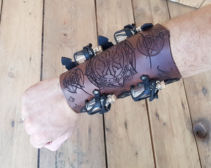 Alchemist bracer with Elemental Sigils.